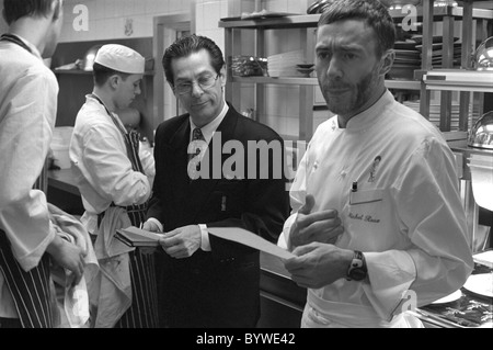 Michel Roux jr discussing the day's menu at Le Gavroche Stock Photo