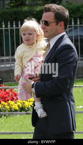 Shane Filan and daughter Nicole at the christening of Nicky Byrne of Westlife and his wife Georgina twin boys, Jay and Rocco at Stock Photo