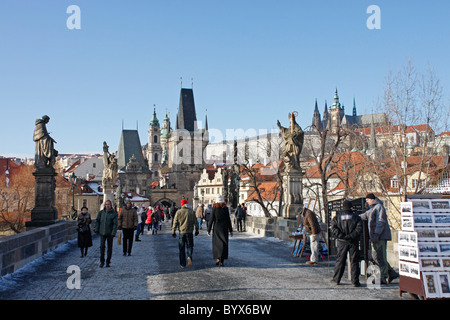 The historic Charles Bridge over the Vitava River,Prague,busy with artists and tourists throughout the year. Stock Photo