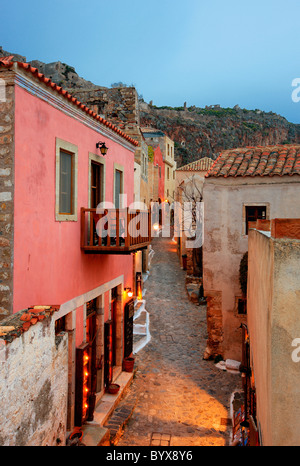 The central alley of Monemvasia, the one that goes from the entrance of the castle, to its main square. Peloponnese, Greece. Stock Photo