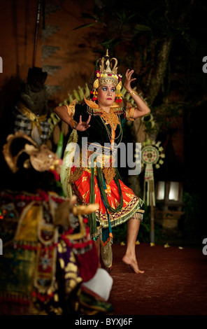 The Hindu Barong and Legong Dance is performed in Ubud, Bali at the Royal Palace stage. The struggle between good and evil. Stock Photo