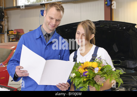 Auto Repair, Master congratulates students Stock Photo