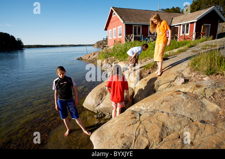 Holiday cottage, near Degerby, Foglo, Aland Islands, Finland. Model released. Stock Photo