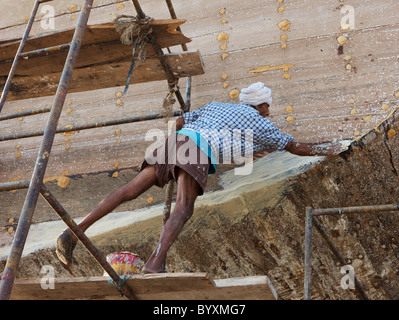 A dhow being repaired in the Jaddaf dockyard, Dubai, UAE Stock Photo