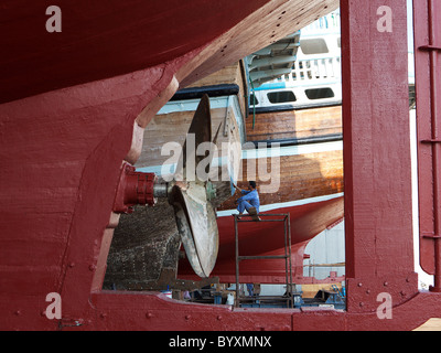 A dhow being repaired in the Jaddaf dockyard, Dubai, UAE Stock Photo