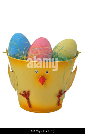 Colorful Easter eggs in bucket isolated on white background with clipping path. Stock Photo