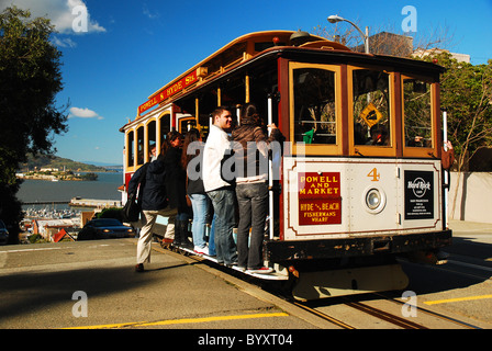 All aboard a Cable Car on San Francisco's Russian Hill Stock Photo