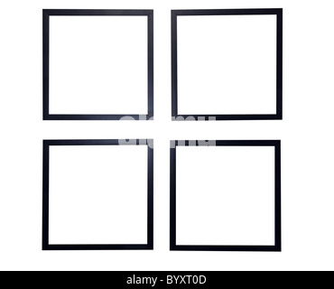 Four blank picture frames isolated on white. Stock Photo