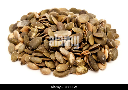 Pumpkin seeds on a white background Stock Photo