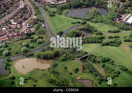 The Dudley No 2 Canal at the southern entrance to Netherton Tunnel at Windmill End Junction with Cobbs Engine House. Stock Photo
