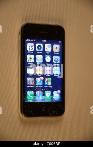Screen broken and cracked on  iphone. Damaged mobile phone. 103991 Iphone Stock Photo