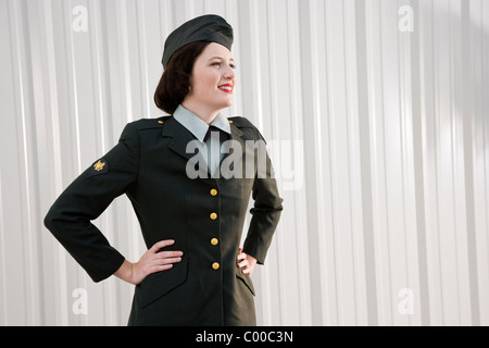 Woman in retro army uniform Stock Photo
