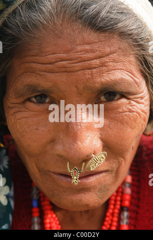 portrait of an older Tharu woman in Chitwan National Park in Nepal Stock Photo