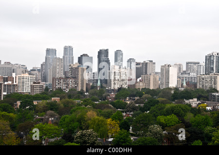 Downtown office and condo buildings along Yonge Street, and the residential neighbourhood of Cabbagetown in the foreground, Toronto, Ontario, Canada. Stock Photo