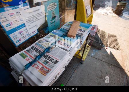 Chinese language newspapers in Brooklyn's Chinatown, the neighborhood of Sunset Park in New York Stock Photo