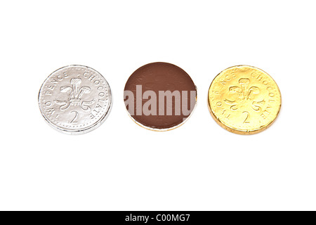 Chocolate money coins isolated on a white studio background. Stock Photo