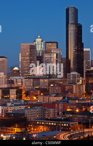 Seattle City skyline at night, dominated by Columbia Tower, as seen from Dr. Jose Rizal Park, Seattle, Washington. Stock Photo
