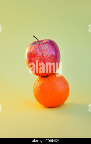 Apples and oranges comparison concept Stock Photo