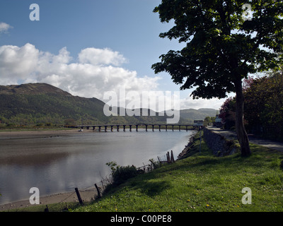 Wooden toll Bridge (1879) across the river Mawddach at Penmaenpool, near Dolgellau, Gwynedd, North Wales Stock Photo