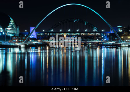 Night-time photograph of the Millenium Bridge over the River Tyne in Newcastle upon Tyne/Gateshead. Stock Photo