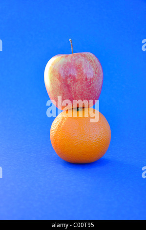 Apples and oranges comparison concept Stock Photo