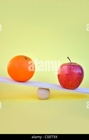 Apples and oranges comparison concept Stock Photo