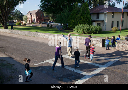 Children Cross Street at McCurdy School Stock Photo