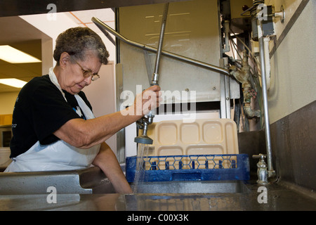 Dishwasher in School Cafeteria Stock Photo