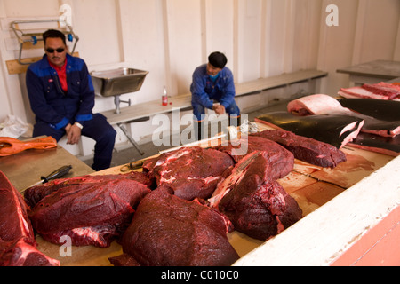 A traditional staple of the Inuit diet, whale meat (Minke in this instance) is sold at this stand in Qeqertarsuaq, Greenland Stock Photo