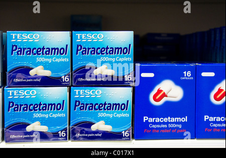 Packets of ' own brand ' paracetamol tablets in a Tesco store, Uk Stock Photo