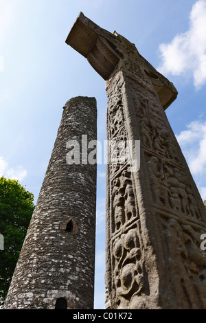 Round tower and the West Cross, High Cross, Monasterboice monastery, County Louth, Leinster province, Republic of Ireland Stock Photo