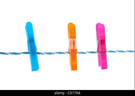 Colorful clothes pins on a laundry rope  Stock Photo