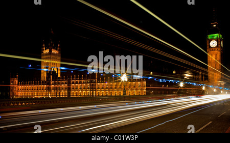 Light trails outside the houses of parliament in London Stock Photo