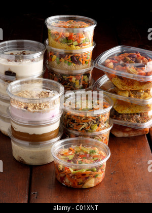 Vegetarian salads and desserts in plastic pots for takeaway Stock Photo