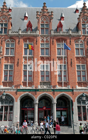 The front facade of the Main Post Office (Posterijen) in the Grote Markt (town square) in historic Bruges (Brugge), Belgium. Stock Photo