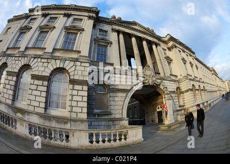 Young couple walking along Victoria Embankment outside Somerset House, London, England, UK, United Kingdom, GB, Great Britain, Stock Photo