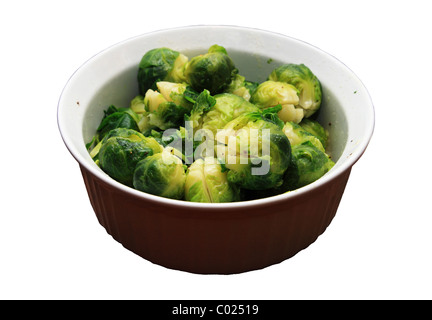 white bowl of cooked brussel sprouts isolated on white Stock Photo