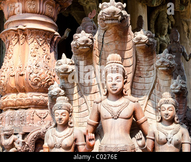 intricate wooden temple carvings Thailand Stock Photo