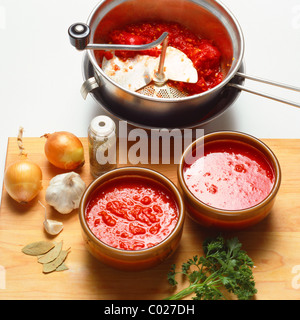 making Marinara tomato sauce Stock Photo