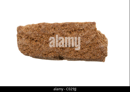 piece of hashish, photo taken with a macro lens, isolated on a white background Stock Photo