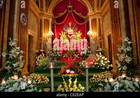 Flowers and other objects make up the sepulchre exhibition that is set up in churches in Malta on eve of Good Friday. Stock Photo