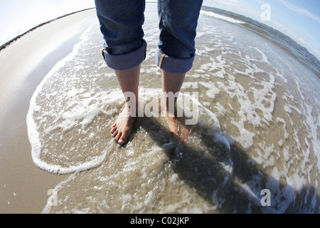 Feet in the sea, beach, Langeoog island, East Frisian Islands, North Sea, Germany, Europe Stock Photo