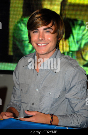 Zac Efron star of  High School Musical 2 sign copies of the soundtrack to  the Disney movie and attend the press conference for Stock Photo