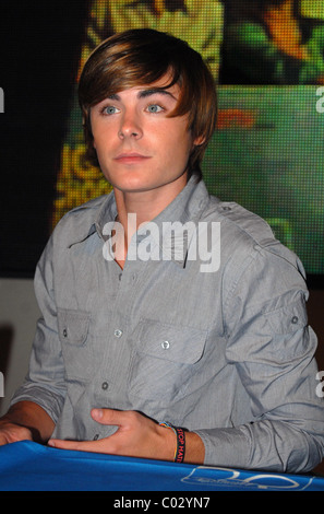 Zac Efron star of  High School Musical 2 sign copies of the soundtrack to  the Disney movie and attend the press conference for Stock Photo