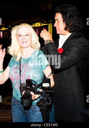 Gene Simmons messing about with a female photographer inside Pure nightclub at Ceasar's Palace Las Vegas, Nevada - 28-08-07 Stock Photo