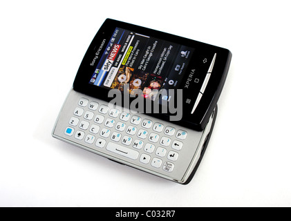 A Sony Ericsson Xperia Mini Pro mobile phone on a white background as a cut out showing the Sky News android application on 3G Stock Photo