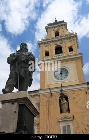 Statue of Garibaldi, in the rear the clock tower of the Palazzo del governor governor's palace, Piazza Garibaldi square, Parma Stock Photo