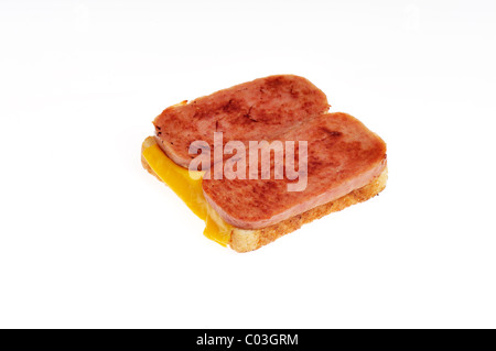 Open-faced Hormel foods grilled Spam white sandwich bread with cheese on white background, cutout. Stock Photo