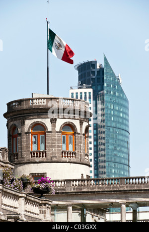 watchtower of 19th Century Chapultepec Castle contrasts with Torre Mayor 20th century glass skyscraper in distance Mexico City M Stock Photo