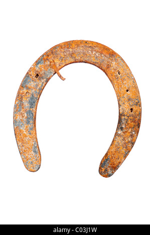 An old rusty horseshoe isolated on a white background. Stock Photo